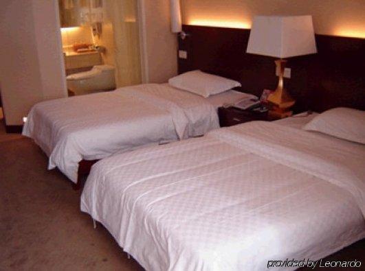 Bluesky Hotel Kanton Pokoj fotografie